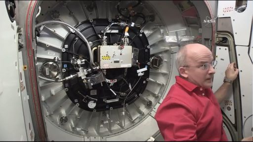 Williams working in the hatchway to BEAM - Photo: NASA TV
