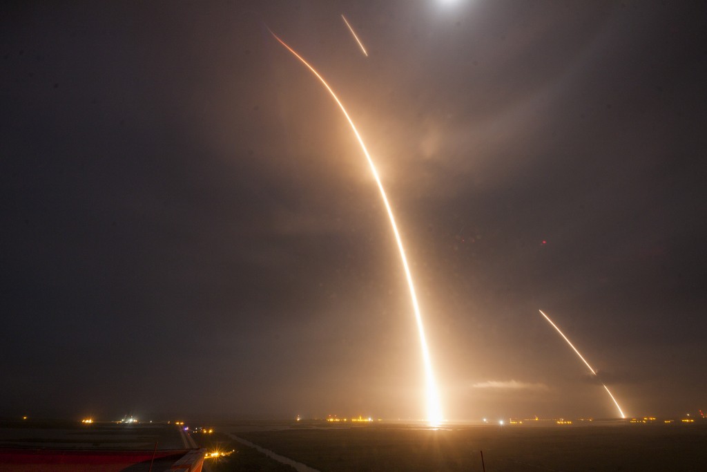 Long Exposure of Monday night's accomplishments, picturing the ascent of the Falcon 9 rocket from its launch pad, the short re-entry burn and the final landing burn to a safe touchdown in Landing Zone 1 - Credit: SpaceX