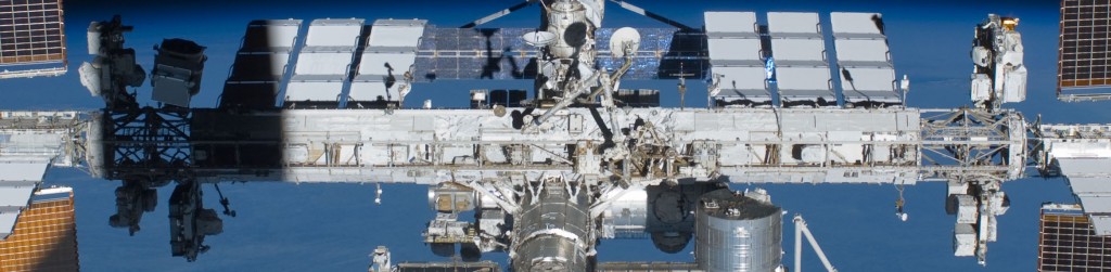 ISS with its Integrated Truss Structure & MT Railway System - The Mobile Transporter and the two CETA Carts can be seen just to the right, off center - Photo Credit: NASA
