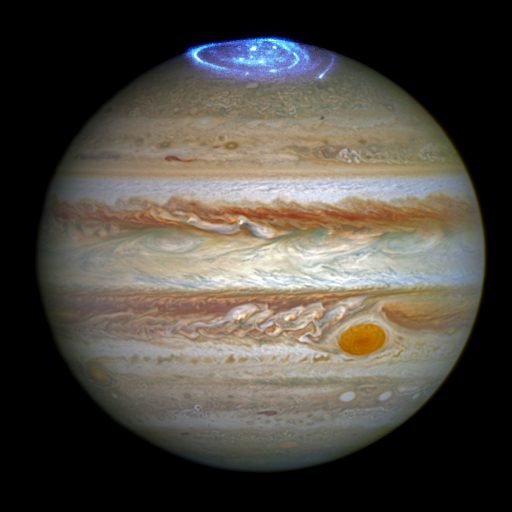Hubble image of Jupiter in visible light with Ultraviolet Aurora capture superimposed on its north pole - Credit: NASA, ESA, and J. Nichols (University of Leicester)