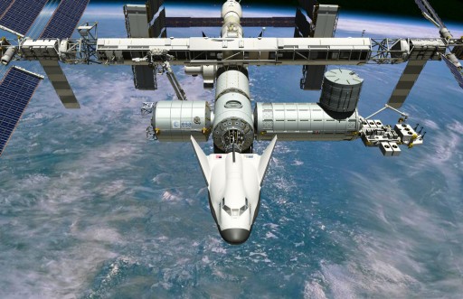Artist's illustration of Dream Chaser docked to ISS - Image: Sierra Nevada