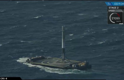  Falcon 9 first stage standing upright atop the Drone Ship after a milestone landing - Photo: SpaceX Webcast